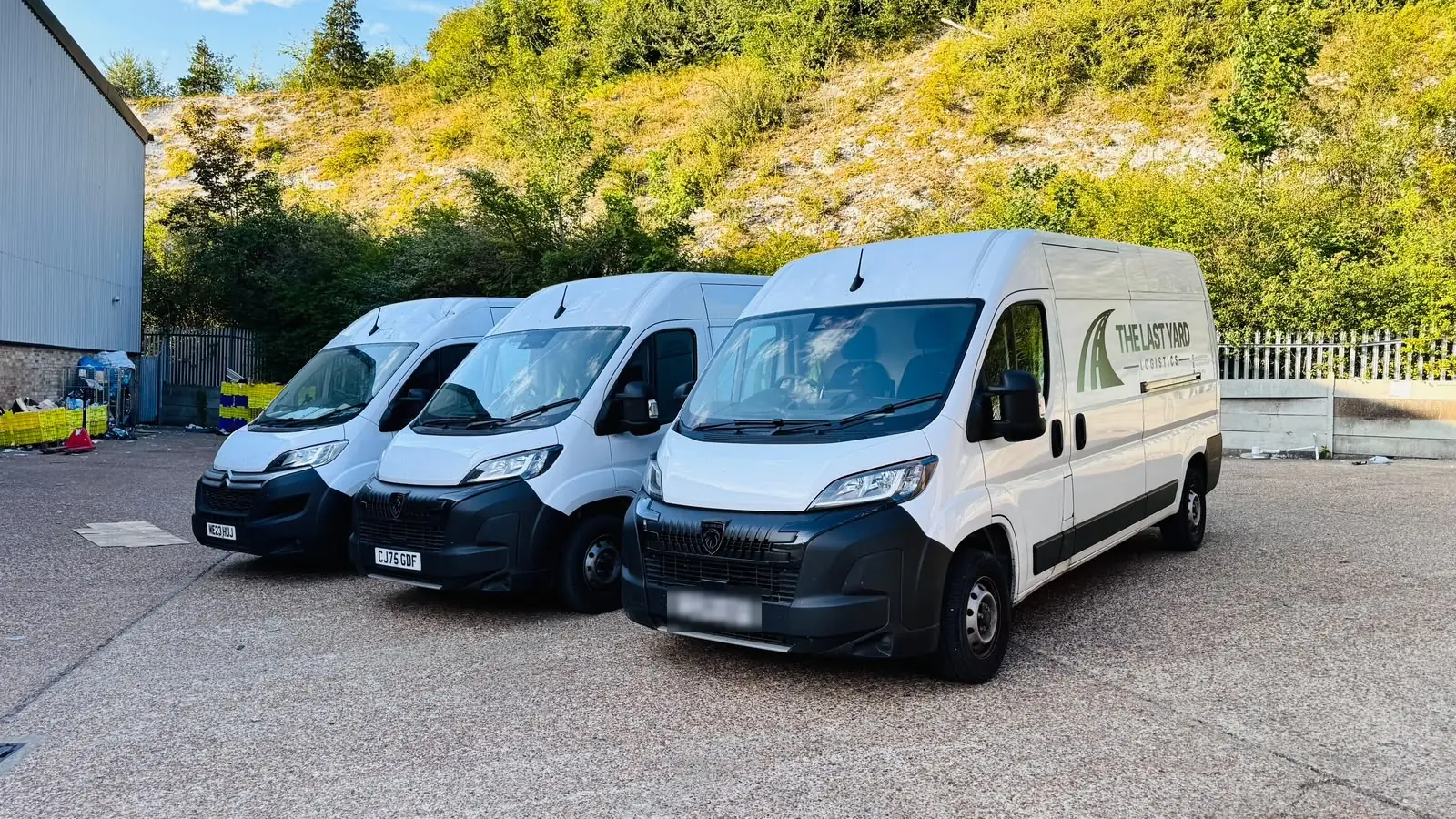 The Last Yard Logistics van fleet lined up ready for the day's routes
