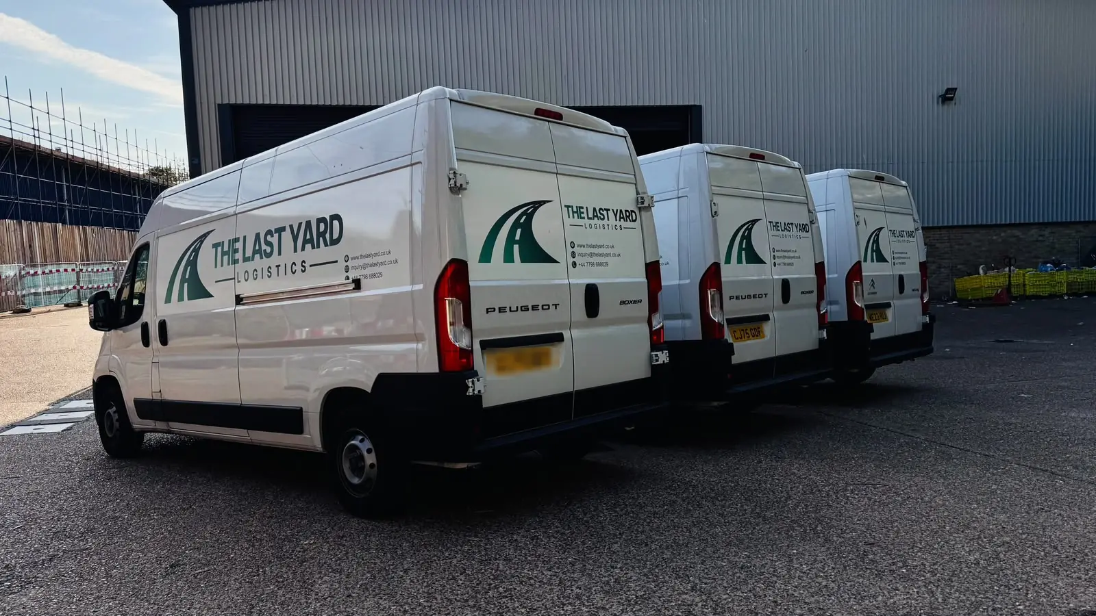 The Last Yard Logistics vans loading at the warehouse