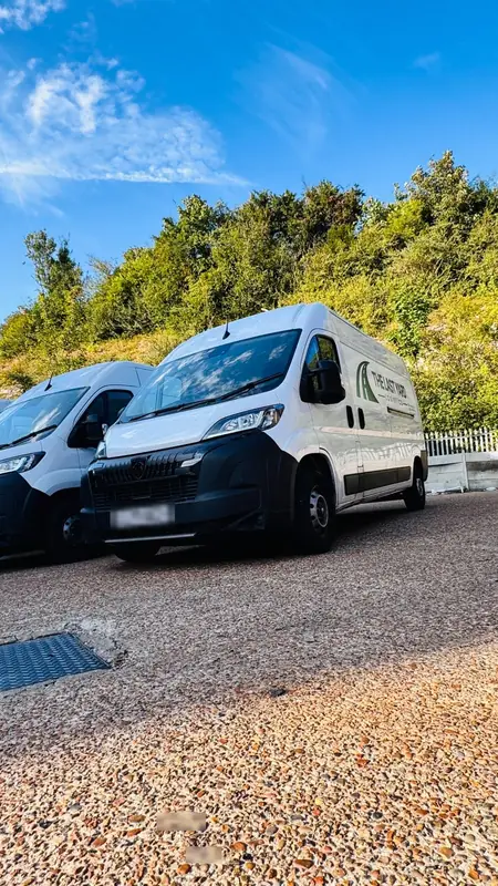 Side profile of a liveried long-wheelbase delivery van